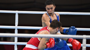 Сакен Бибосынов (в синем). Фото: olympic.kz/Сали Сабиров©